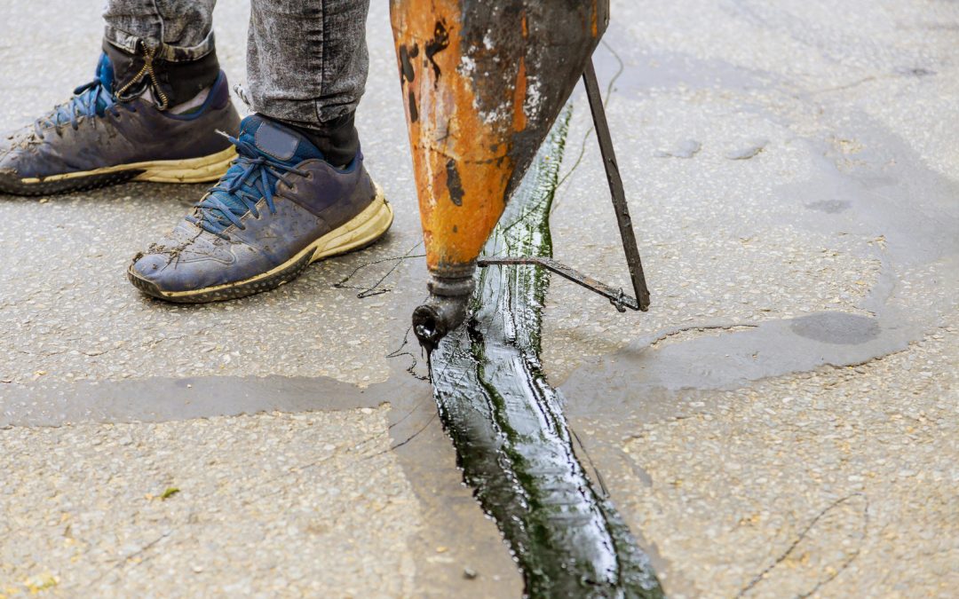 What Is Crack Filling and How Does It Protect Your Asphalt?