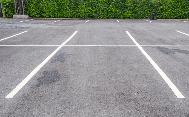 Smooth Rides Ahead: 4 Benefits of Asphalt Paving Your Parking Lot